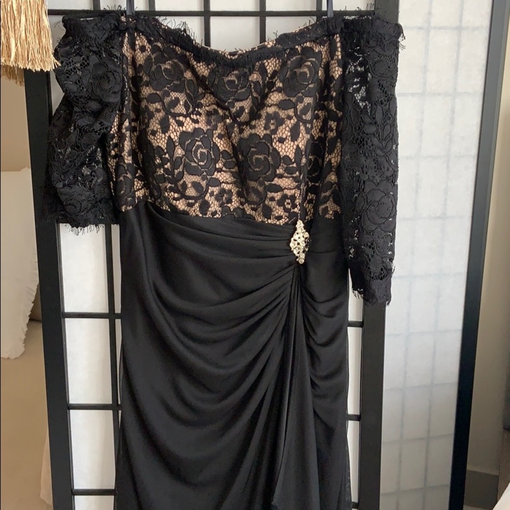 Full length off the shoulder evening dress.